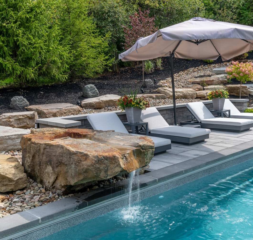 Backyard fountain in Chagrin Falls, OH enhancing landscape design with bubbling water