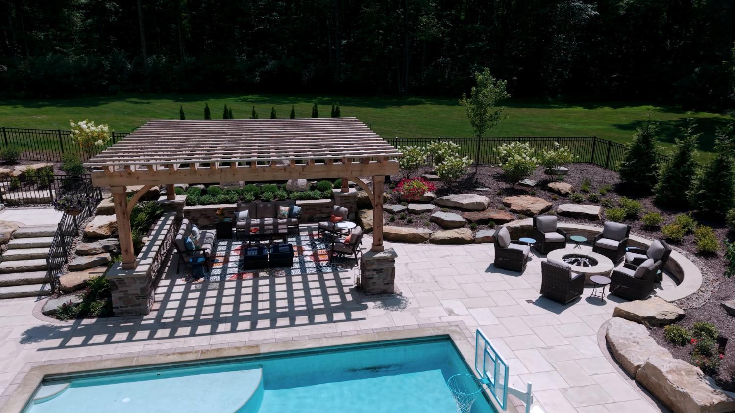 Cedar pergola enhancing a stone outdoor living area in Northeast Ohio
