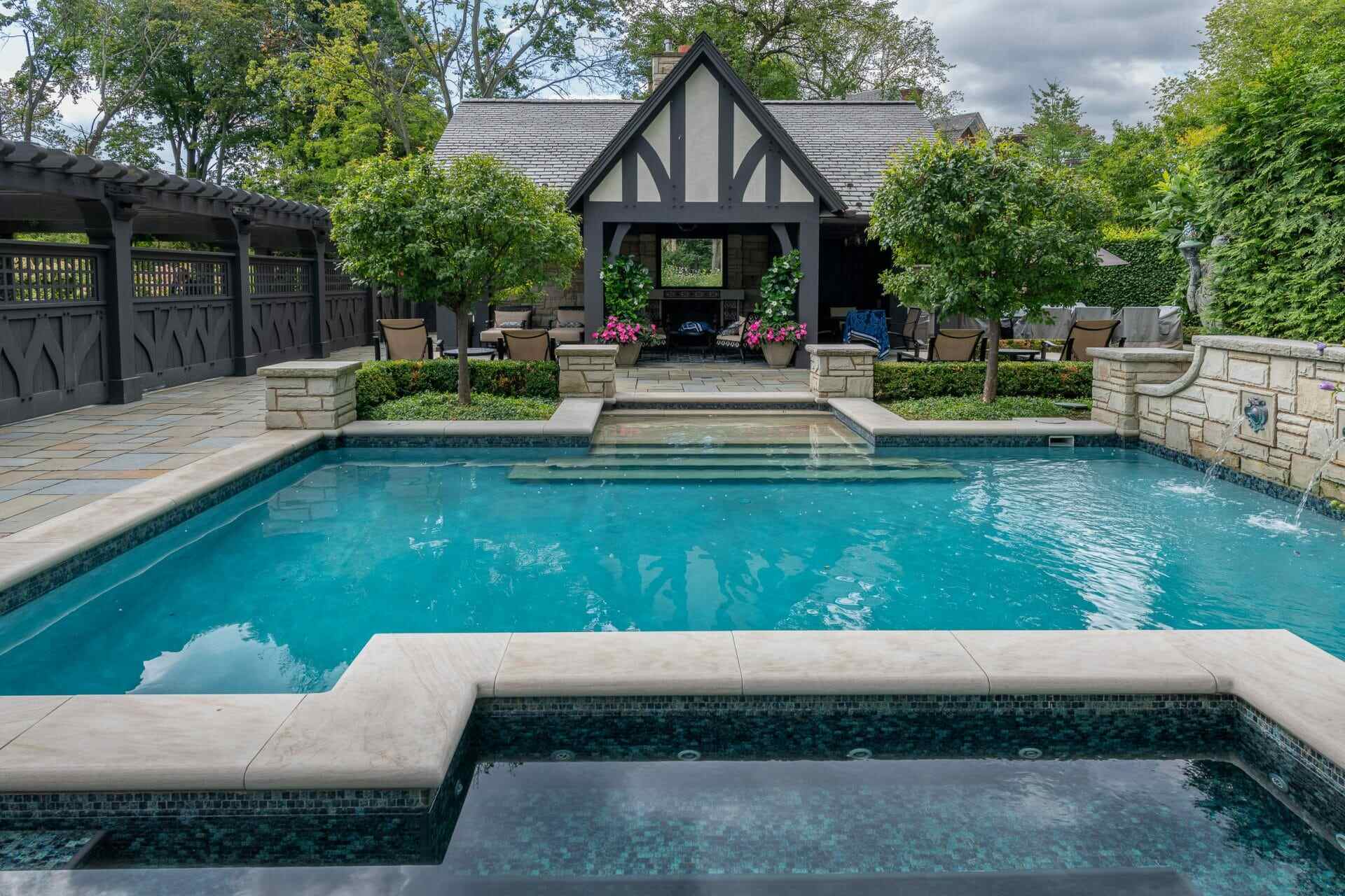 Expansive backyard with a custom pavilion and spa-style pool in Hudson, OH. Expansive backyard with a custom pavilion and spa-style pool in Hudson, OH.