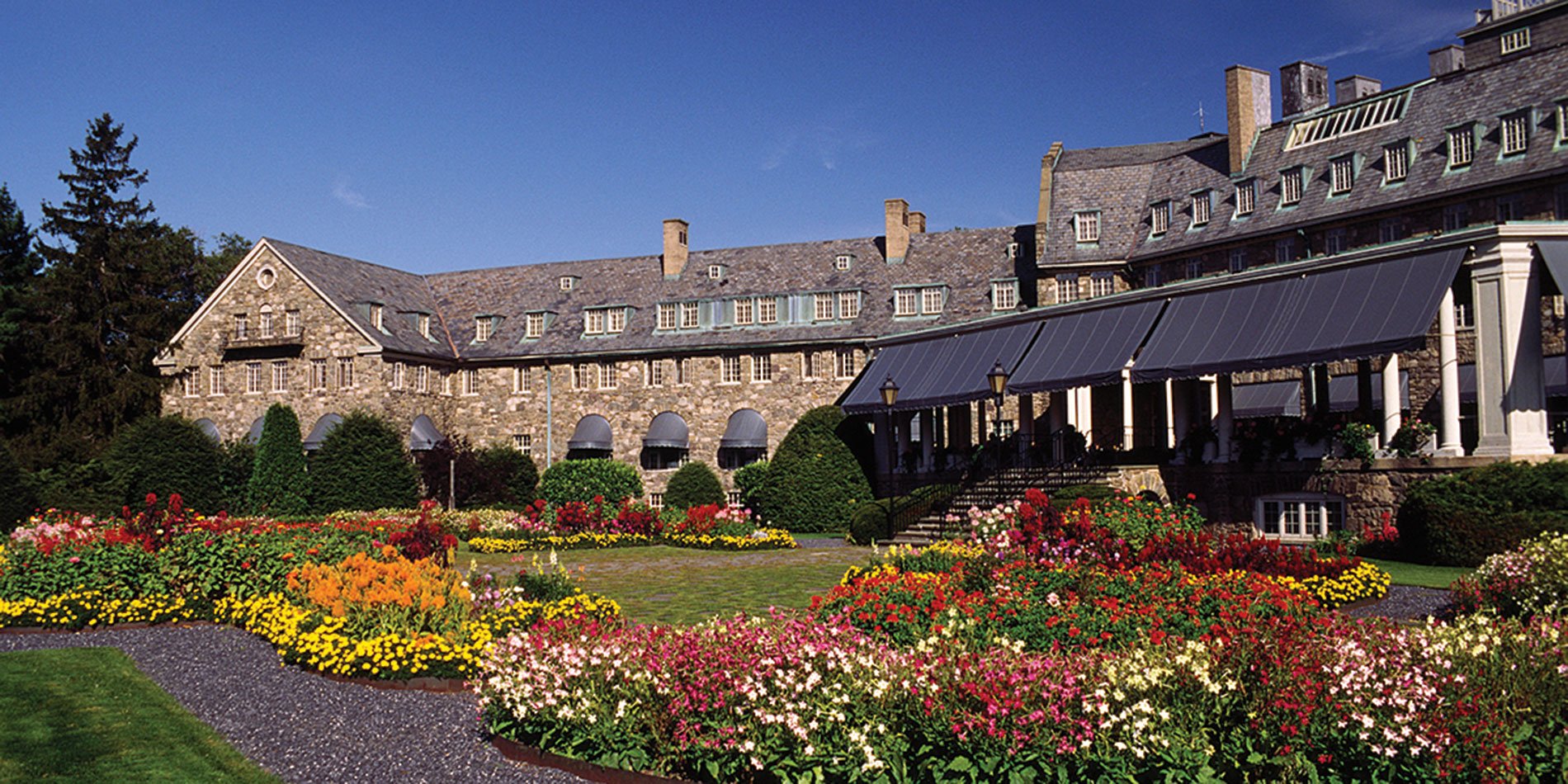 Hotel grounds with landscaped gardens and seasonal color