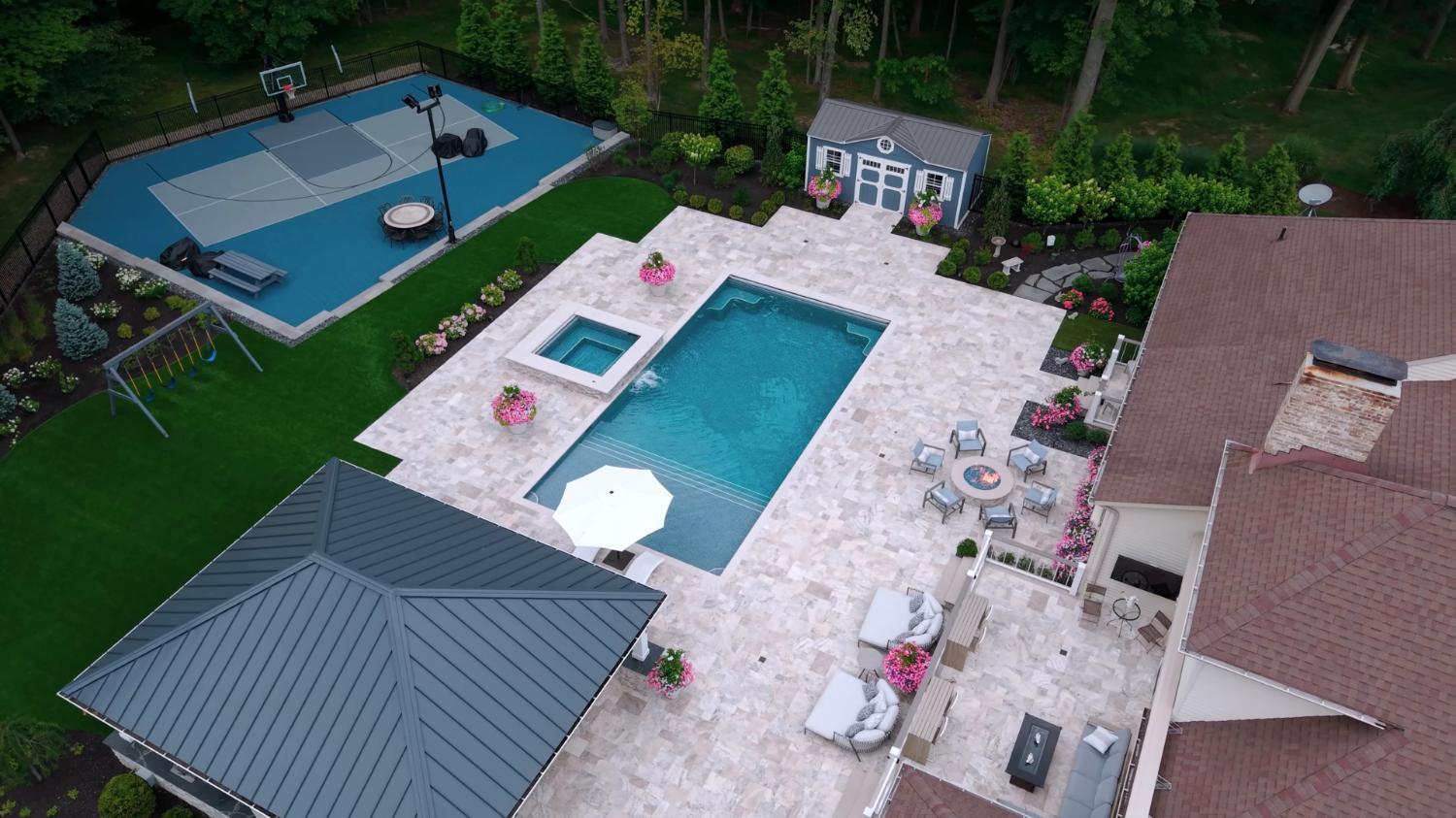High-end outdoor living design blending stone and wood in Highland Heights, OH High-end outdoor living design blending stone and wood in Highland Heights, OH