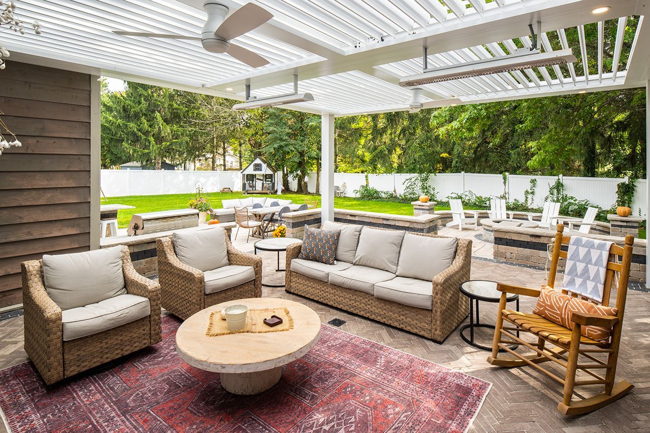 Covered pergola lounge with outdoor seating