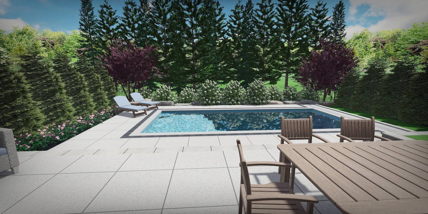 Inground pool with stone deck and lounge chairs
