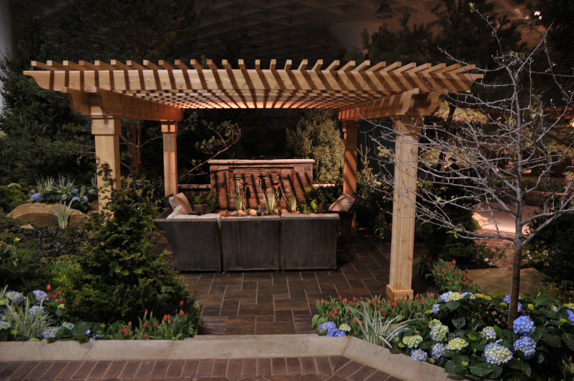 Pergola with built-in lighting over an outdoor living area