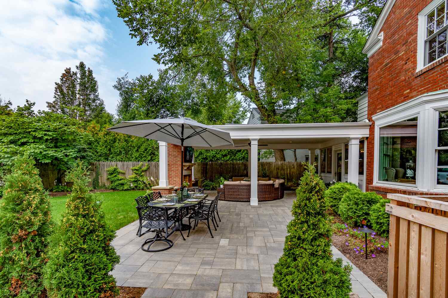 Outdoor entertainment space with custom paver patio in Moreland Hills, OH Outdoor entertainment space with custom paver patio in Moreland Hills, OH