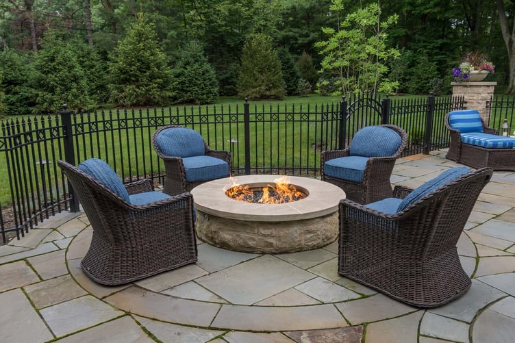 Outdoor fire feature in Aurora, OH enhancing the patio with warmth and visual appeal