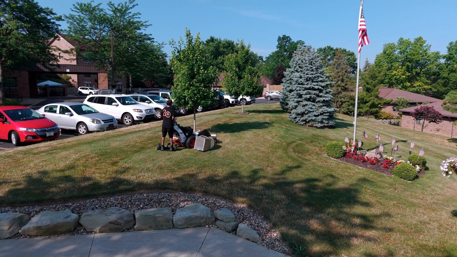 Commercial landscape maintenance crews servicing a 25-acre property in Ohio