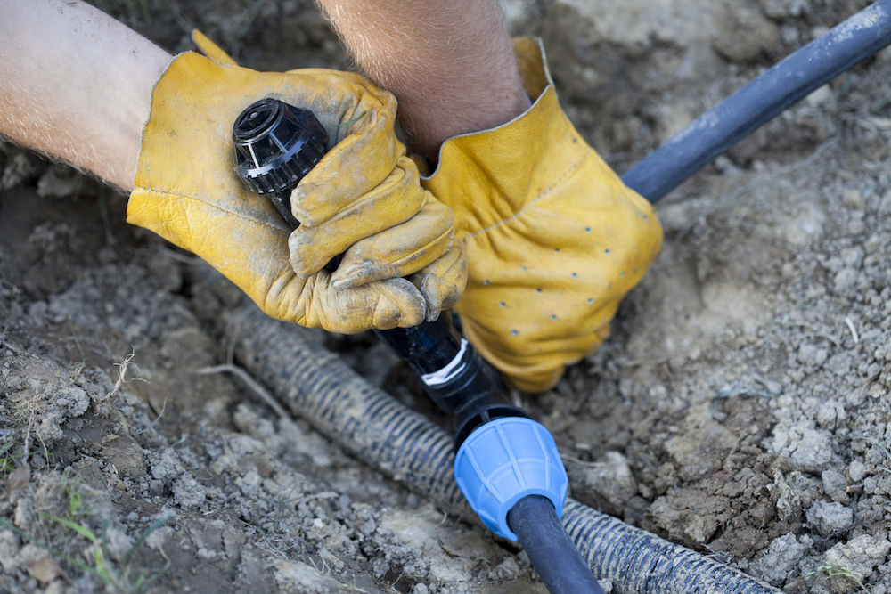 Irrigation system installation with new supply line and fittings