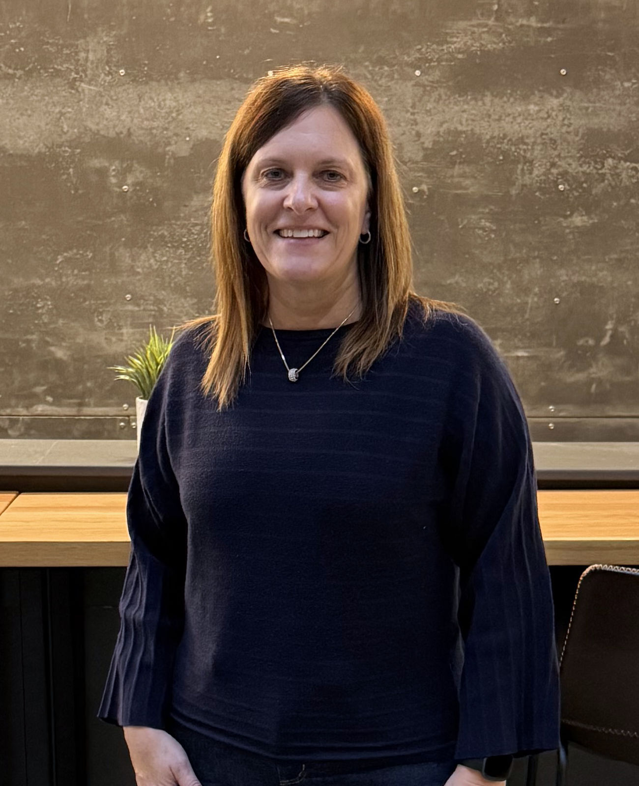 Lori Sprague, VP of People Ops at Exscape Group